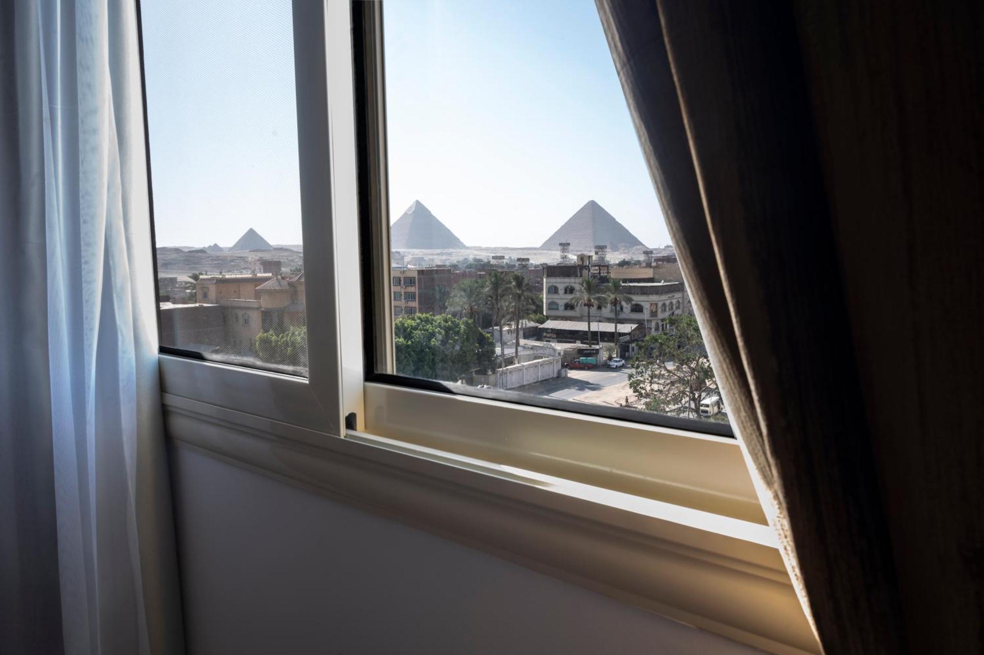 Palm Pyramids View Hotel Kafret el-Gabal Habitación foto